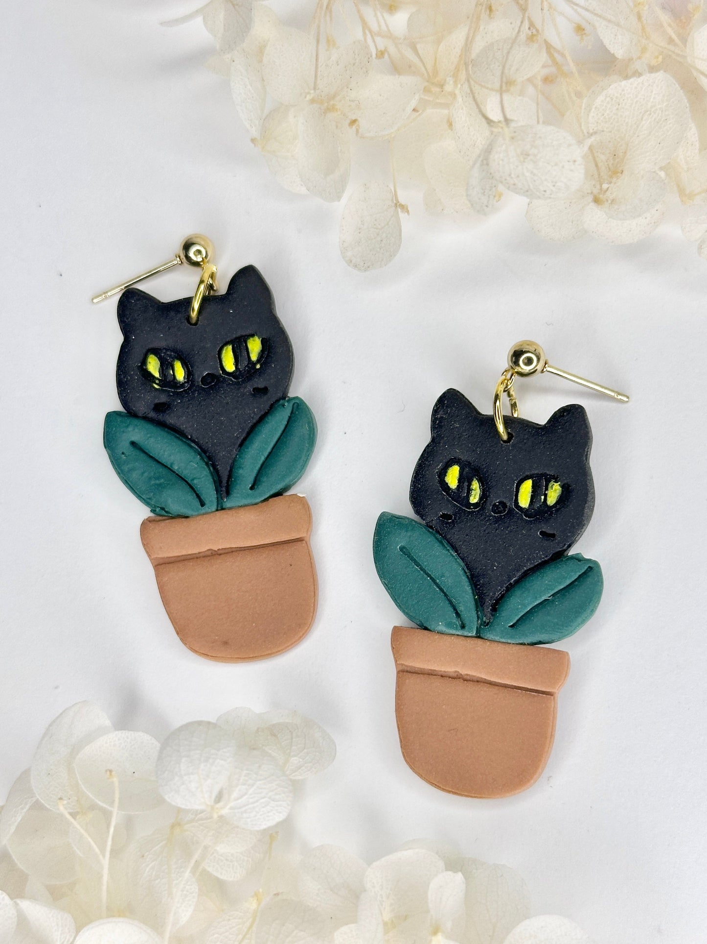 Sneaky Cat on Plant