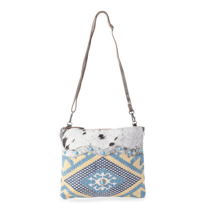 Myra Tufts Pattern Woven Hairon Crossbody â€“ Tribal Geometric Print with Leather Strap and Studded Accents